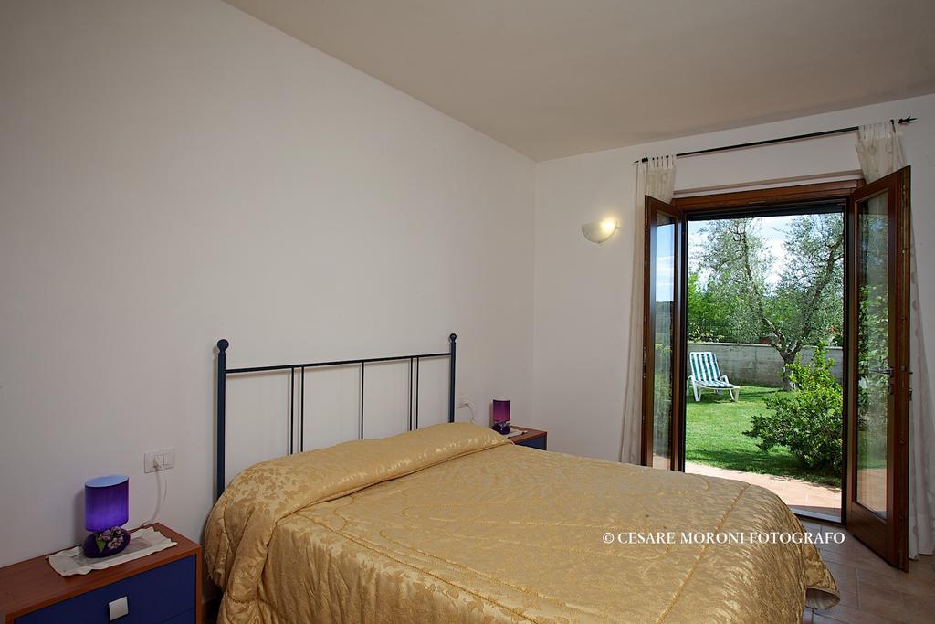 Residence Ai Campi Da Golf Saturnia Pokoj fotografie