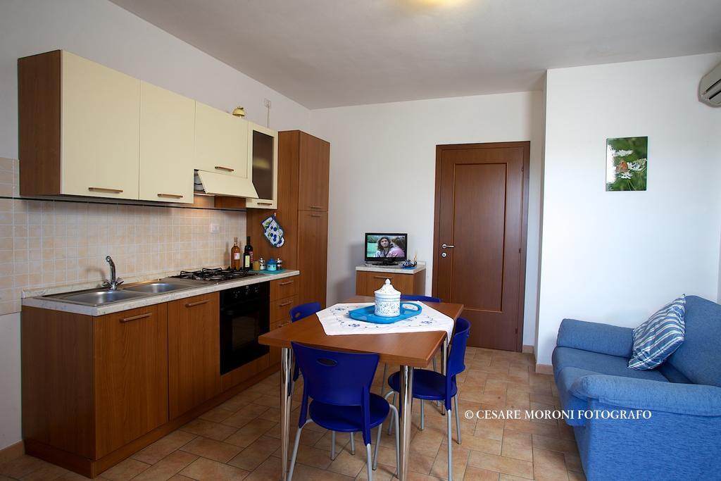 Residence Ai Campi Da Golf Saturnia Pokoj fotografie